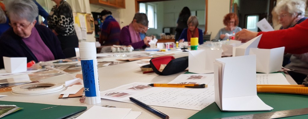 guild members crafting mini books